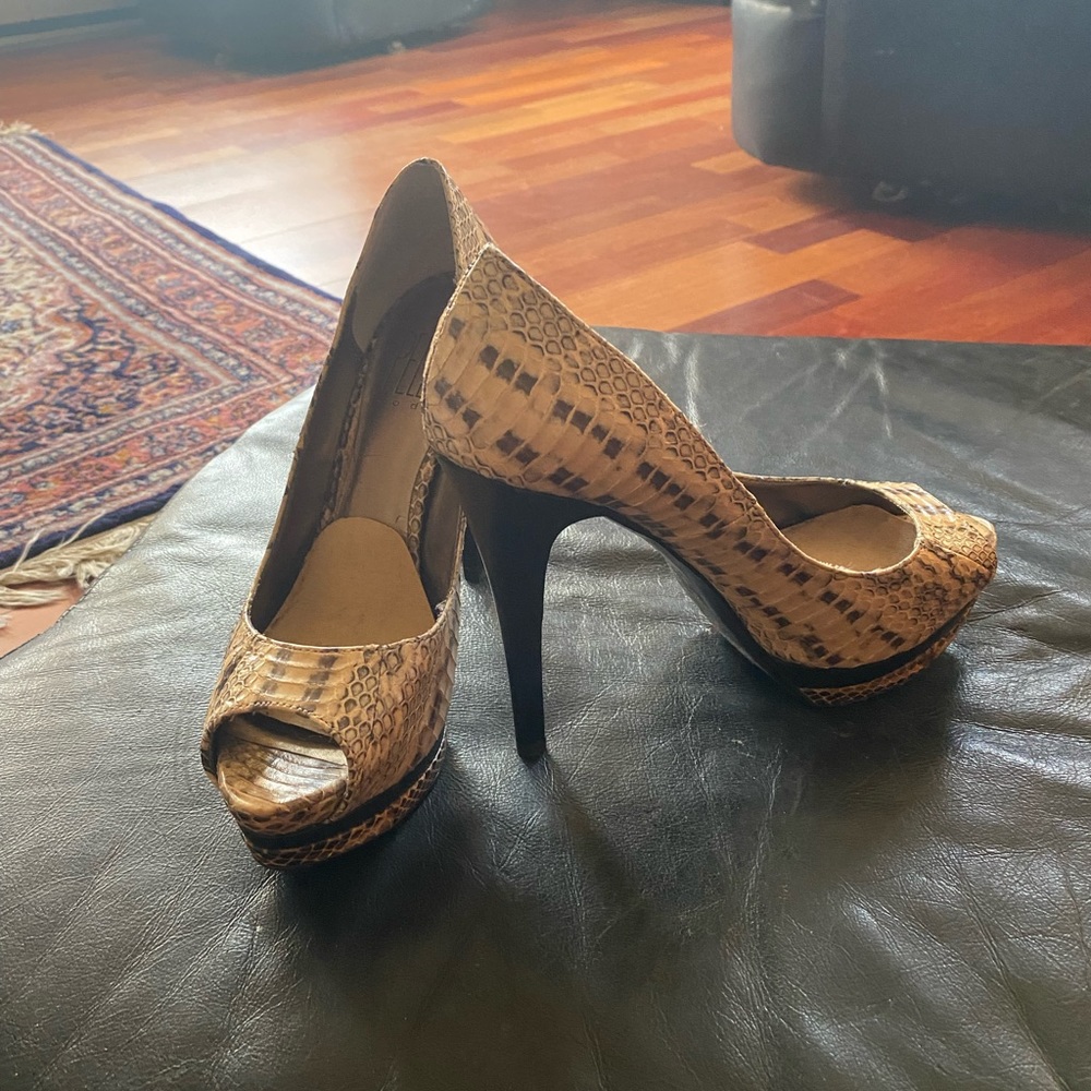 Pelle moda peep toe python leather. 5” heels 1” platform.